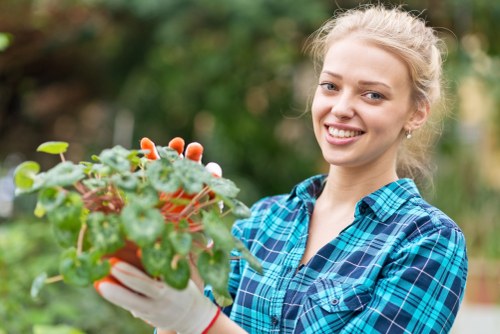 Front view of a gardener working in a Wanstead garden